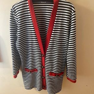 Black and white striped cardigan with red trimming
